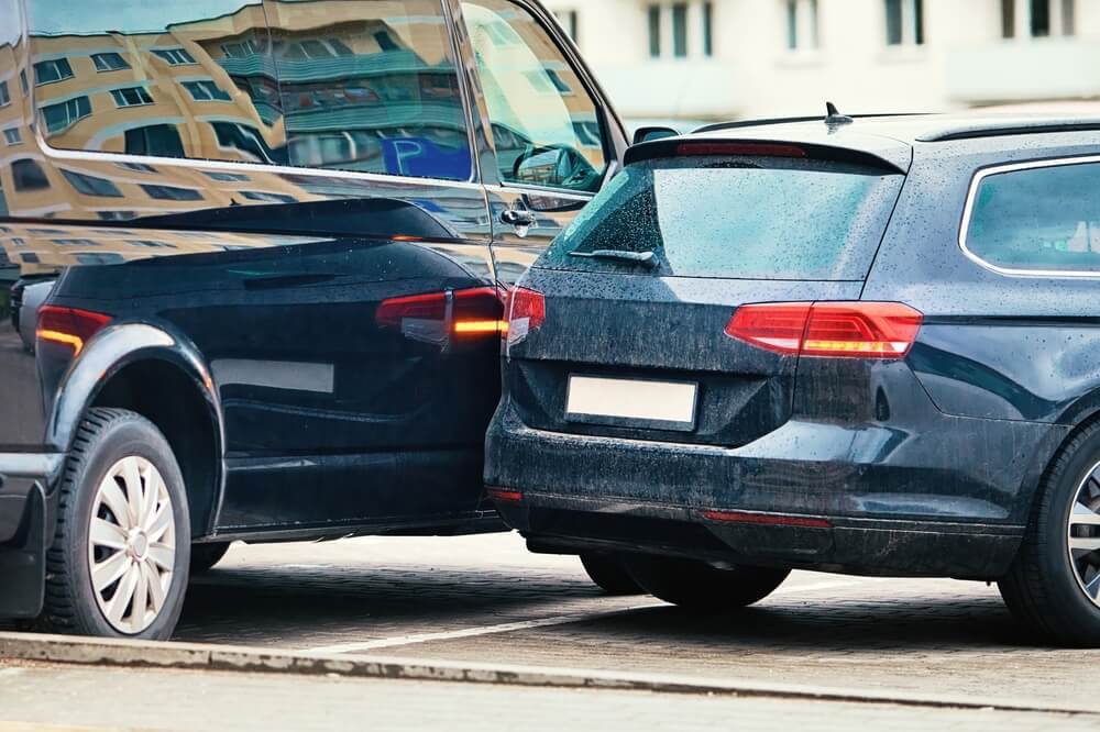 Van vs sedan accident at the parking lot